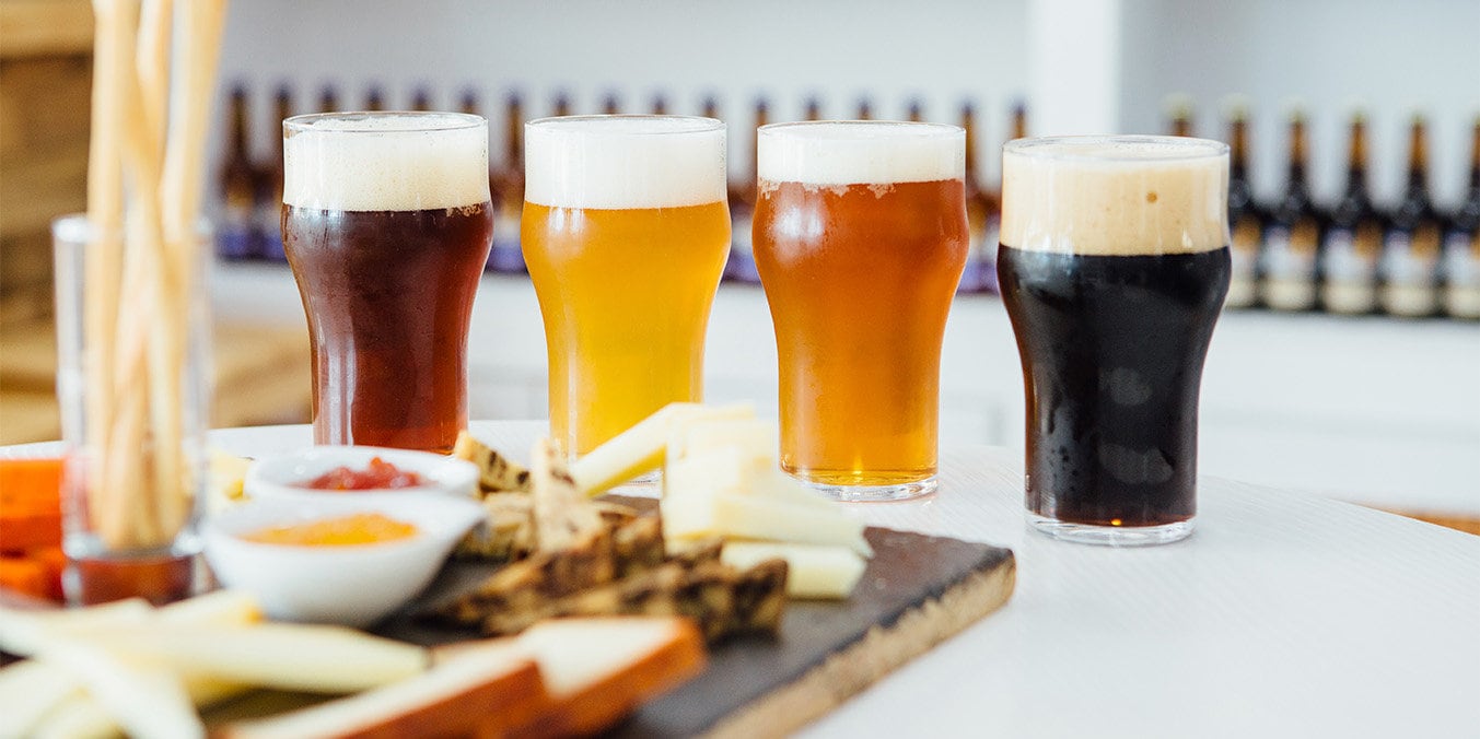 craft beer with a cheeseboard
